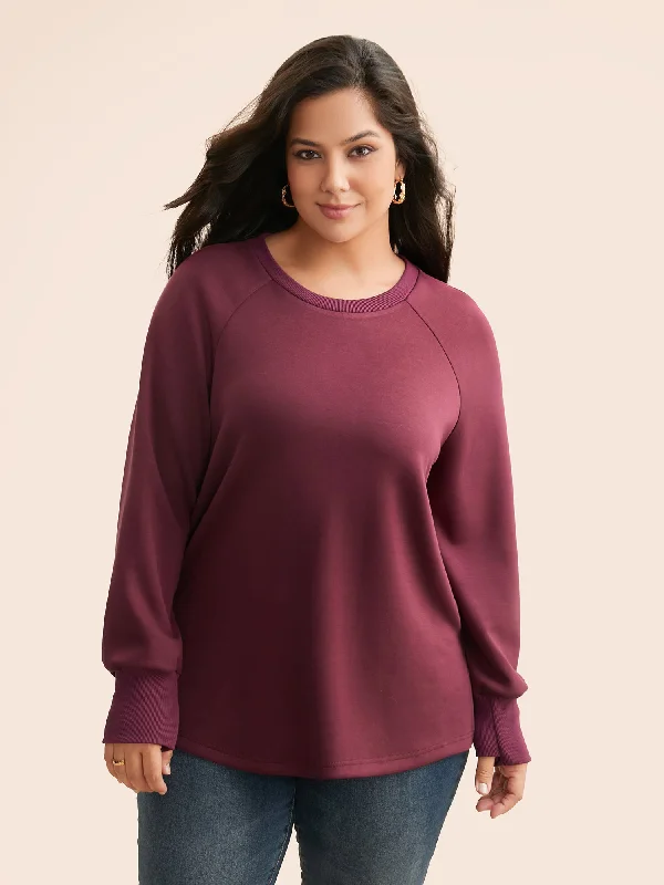 Solid Raglan Sleeve Slit Hem Sweatshirt